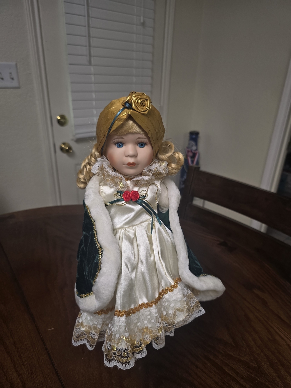 Vintage Porcelain Doll in Cream Satin Dress with Green Velvet Cape